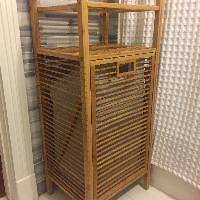 It's made from steel wire with a white finish, and. West Elm Bamboo Slatted Laundry Hamper Aptdeco