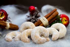 These are mini versions of the linzer torte/ pastry which is a huge pastry with a jam filling and a beautiful lattice work on top. Austrian Holiday Vanillekipferl Cookie Recipe Vanilla Crescent Cookies Gimme Yummy Recipes