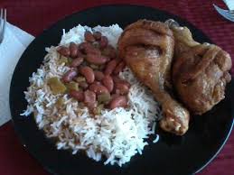 The salty crunch with the softness of the rice and beans? Puerto Rican Rice And Beans With Fried Chicken Legs Yummy Fried Chicken Legs Favorite Recipes Tasty