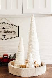 30 amazing diy christmas wall art ideas. Yarn Tree Diy With Twinkle Lights Hallstrom Home
