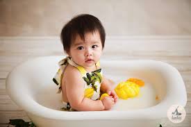 Baby bath — understand the basics, from testing water temperature to holding your newborn securely. Baby Milk Bath Photography Is Definitely A Different Way Of Celebrating A Half Birthday Without Baby Milk Bath Milk Bath Photography Baby Milk Bath Photography