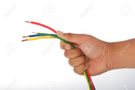 Use the given colors for reference purposes only. Hand Holding A Red Green Yellow Blue Wire On White Background Stock Photo Picture And Royalty Free Image Image 10223461