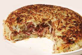 Swiss Rosti Made From Shredded Potatoes Swiss Recipes Swiss Cuisine Slovakian Food