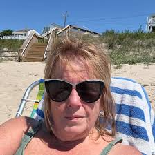 Kylie Kelce is opening up about her choice to use gender-neutral names for  her daughters.