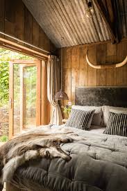 Brave log cabin master bedroom design with stacked stone fireplace also single rustic. 26 Best Rustic Bedroom Decor Ideas And Designs For 2021