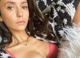 Nina Dobrev wears pink bra in sultry selfie