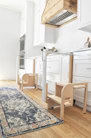 You're done with this diy toddler step stool with guard rail. Our Ikea Kitchen Remodel Reveal