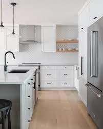 12 Ways To Revamp Your Kitchen Cabinets For The Ultimate Makeover In 2021 Black Kitchen Faucets White Kitchen Design Kitchen Design