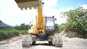 Heavy Equipment Excavator Running Over Stock Footage Video 100 Royalty Free 2574614 Shutterstock