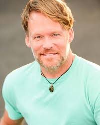 Roll from swan into swan dive for an impressive back line strengthener.  Done with arms to the side like T-straps, or for a more challenging version  arms out in front like swimming.