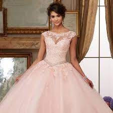 Shop these pink plus party dresses to find light pink and baby pink dresses adorned with delicate details like lace appliques, ruffles, and illusion cut outs. Plus Size Pink Wedding Dresses