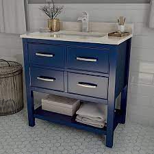 Navy blue got its name from the dark blue (contrasted with naval white) worn by officers in the royal navy since 1748 and subsequently adopted by other navies around the world. Home Decorators Collection Brookbank 30 Inch 2 Drawer Vanity In Navy Blue With White Engineered M Blue Vanity Home Decorators Collection Single Bathroom Vanity