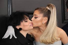 Ariana grande is lovely with her signature hairstyle. Ariana Grande Ditches Signature High Ponytail For Natural Curls