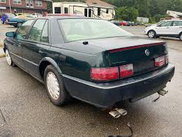 Image result for Black Sapphire 1993 Cadillac