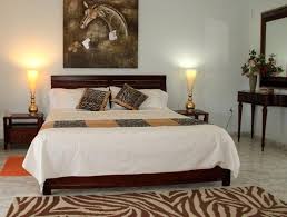 Maybe you would like to learn more about one of these? African Theme Bedroom Bedroom Decor Ideas Image Small Room Decor African Home Decor African Bedroom