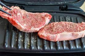 How To Cook New York Strip Steaks On A George Foreman Grill Livestrong Com Grilled Steak Recipes Ny Strip Steak Recipes How To Grill Steak