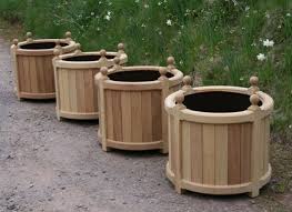 These planter boxes are made of log slices. Flower Pot Design Wooden Novocom Top