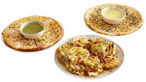 Browse the menu, view popular items, and track your order. Bombay Pizza Kitchen Modern Indian Pizzeria Menu