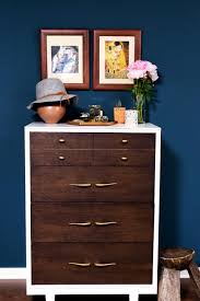 I got it back in august? White Dresser With Wood Drawers Pops Against Navy Blue Walls Hgtv