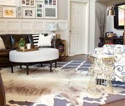 A Cowhide Rug Accident With A Happy Ending Decorchick Cowhide Rug Living Room Rugs In Living Room Layered Rugs