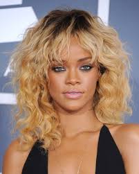 Long blonde center part hairstyle. Rihanna Doesn T Mind If Her Lace Front Shows A Little Bit W Magazine Women S Fashion Celebrity News