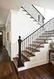 A custom wrought iron railing can beautifully accent a straight or curved staircase. 44 Stair Railing Simple Iron Railing Design