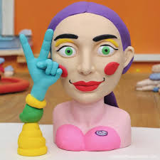 a thin lipped mouth twisted into a perpetual frown and a sharp Prompts