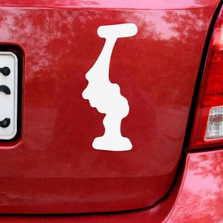 My grandpa saw this sticker and took a pic. What is it?? He wants to know.  Check The First C0mment