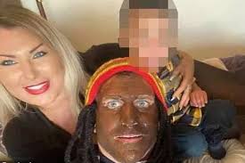 Dad sparks outrage after 'blacking up' alongside mixed race children for  family photo at 5-star hotel