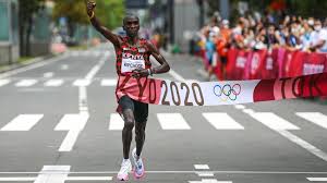 With a subtle but unmatchable surge in mile 19, eliud kipchoge of kenya broke the pack and ran solo the rest of the way to repeat as olympic marathon champion. P 1ibpbfo8zdgm