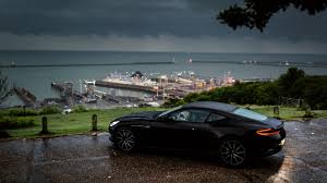 1366x768 Aston Martin Db11 Rain Outside In Nature 1366x768 Resolution Hd 4k Wallpapers Images Backgrounds Photos And Pictures