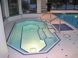Visit our large hot tub showrooms in surrey, northants, cheshire and kent. Jacuzzi Hot Tub Next To The Tiled Indoor Pool Picture Of The Sutton Place Hotel Vancouver Tripadvisor