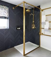 You just need some long and thin black subway tiles like these ones, and then you arrange them in a diagonal pattern. 11 Bathrooms With Black Herringbone Tiles
