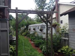 Old Wooden Ladder Garden Arch Arbor Hubby Made Me Garden Arch Old Wooden Ladders Rustic Gardens