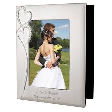 Engraved weddings gifts are a popular option these days. Personalized Wedding Romance Silver Photo Album With Frame