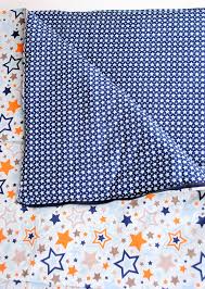 In a 5 inch piece of ribbon, cut 2 holes for the buttons. Kids Sleeping Bag Pattern Tutorial