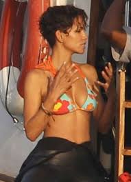 Berry, who, no matter what part she is playing, gives it a brittle defensive edge. Halle Berry At Her Bikini Best In Dark Tide Trailer Watch