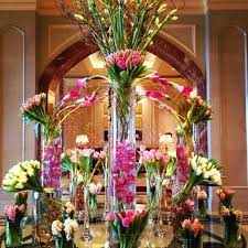 A Dazzling Pink Tower Of Flowers At Mandy Bryant Dewey Seasons Hotel Doha Hotel Flowers Flower Decorations Large Flower Arrangements