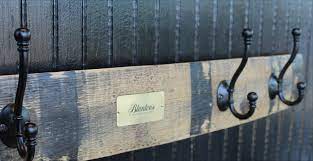 The wine barrel stave coat rack securely anchors to the wall on both ends and gracefully arches away in the center. Blanton S Bourbon Barrel Stave Coat Rack The Official Blanton S Bourbon Shop