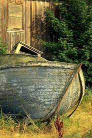 Old Faded Wood And Remnants Of An Old Cannery And Fishboat Wooden Boat Building Wooden Boats Boat Building
