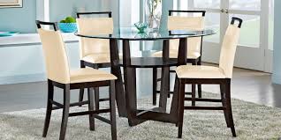 This 5 piece counter height table set includes one counter height rectangular table size 30 in x48 in and 4 matching counter height chairs with faux leather seat finished in black. Counter Height Dining Room Sets