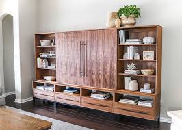 The slats are held together by gluing them to a piece of canvas. How To Build A Diy Entertainment Center Modern Sliding Door Media Unit