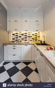 white floor tiles stock photo