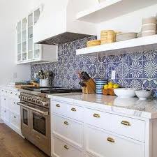 White Kitchen With Blue Mosaic Tiles Kitchen Backsplash Designs Kitchen Cabinet Design Kitchen Backsplash Tile Designs
