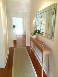 Entryways are known as collection spots for shoes, discarded jackets. Top And Fabulous Tiny Entryway Ideas Breakpr Narrow Hallway Decorating Entrance Hall Decor Hall Decor