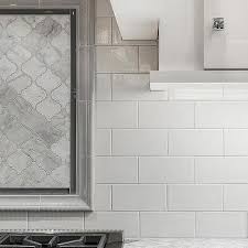 White italian marble with soft to medium random gray veining formed in wide waves. Kitchen Arabesque Tile Backsplash Design Ideas