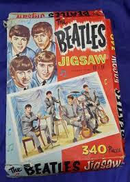 Like most of the band's previous releases, the album topped record charts in many countries, including both the us and the uk. The Beatles The Beatles Jigsaw 340 Pieces Uk Memorabilia 700500 Jigsaw