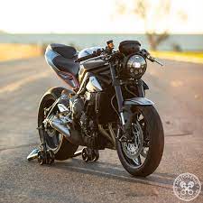 Pin Op Triumph Triple