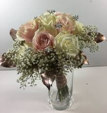 Just like the image above it, this one also has a band of faux birch bark and a beautiful blue sky background! C76 Rose Clutch With Rose Gold By Flower Girl Florist