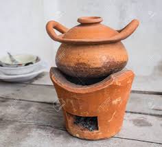 To paint clay pots, start by sanding the surface, then wash the pot and let it dry completely. Set Oven And Traditional Clay Pot Cooking Stock Photo Picture And Royalty Free Image Image 32771917